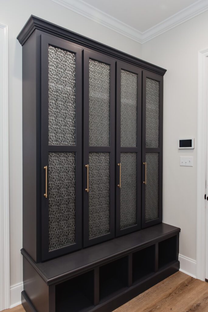 updated mud room cabinet design with pattern glass for holiday guests