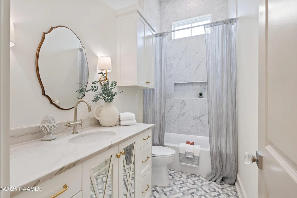 Legendary Contractors 2025 Parade of Homes, 201 Ivy Cottage, hall bathroom antique mirror cabinet glass by M&M Glass