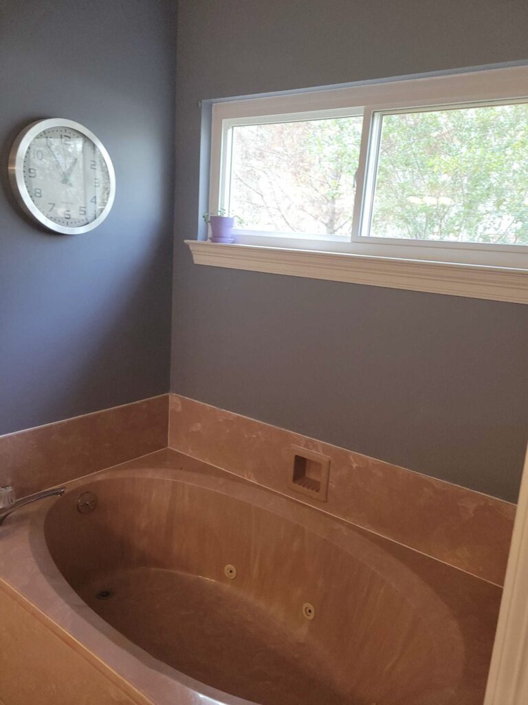dated bathroom soaker tub 