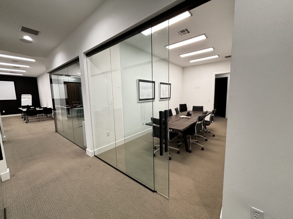 Glass conference room sliding glass door | M&M Glass Company 