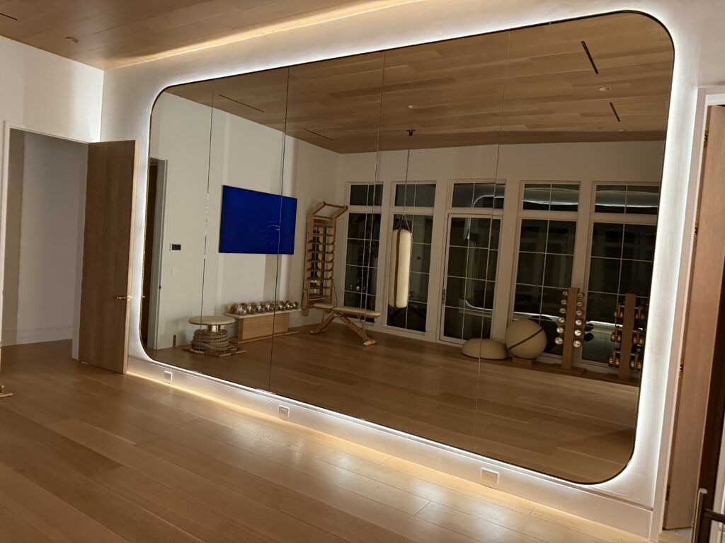 Gym mirror wall backlit